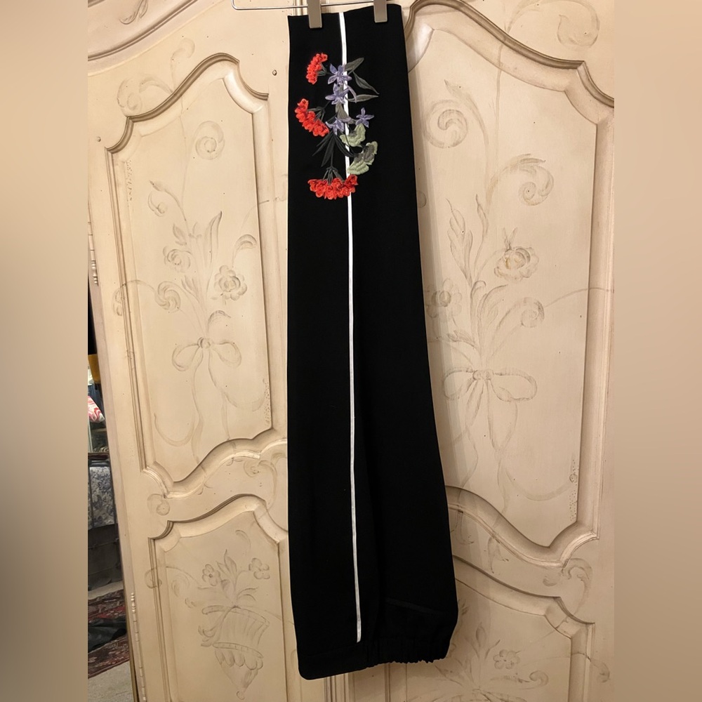 Black Ted Baker pants with white detail on sides and gorgeous floral embroidery